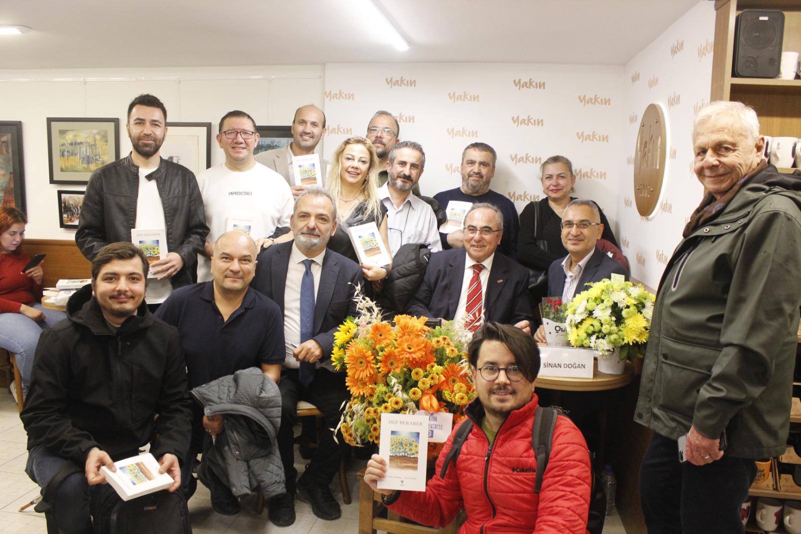 İGC ÜYELERİ DELİBAŞI VE DOĞAN ‘HEP BERABER’ KİTABINI İMZALADI